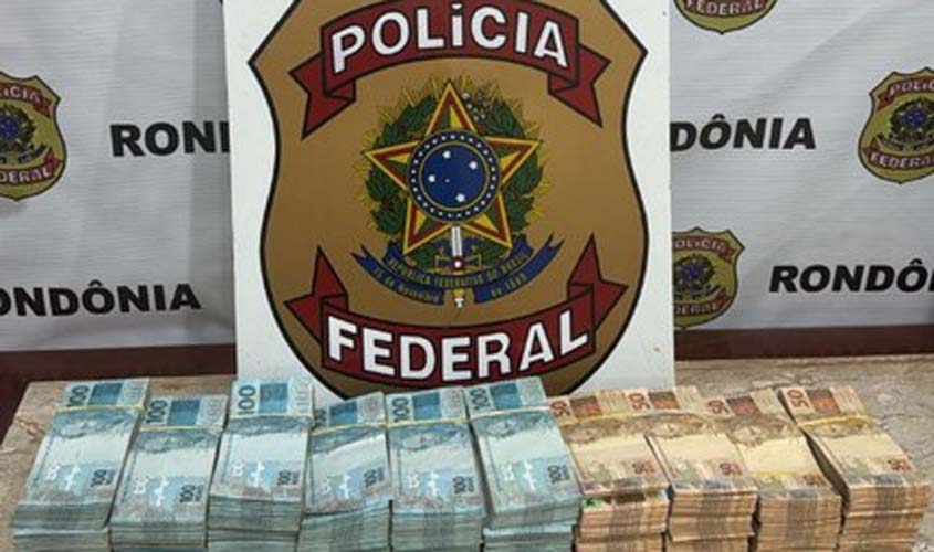 PF apreende R$ 600 mil e prende por porte ilegal de arma 